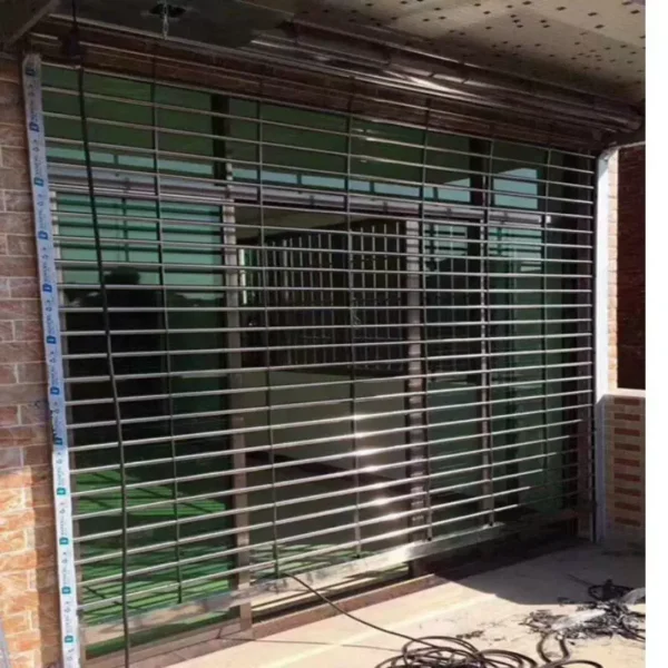 Stainless steel electric through flower rolling shutter for shops